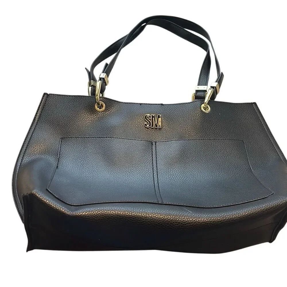 Steve Madden Black tote, small flaw on top above nameplate